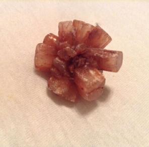Amber colored bursting stone