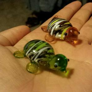 Two glass turtles