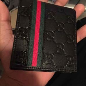 Brand new Gucci wallet in box.
