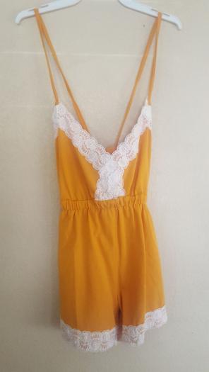 Mustard romper. Nwot.