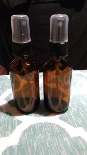 2 amber glass bottles