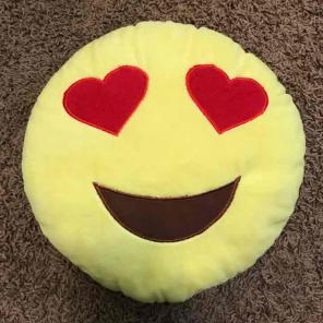 Heart eye emoji pillow
