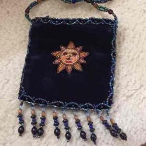 Beaded shoulder pouch sun motif zip top