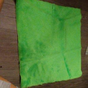 Short green fur fabric sample