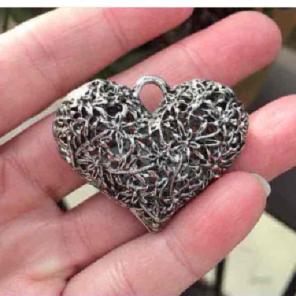 Floral filigree heart pendant