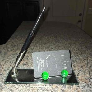 Mirrored business card holder
