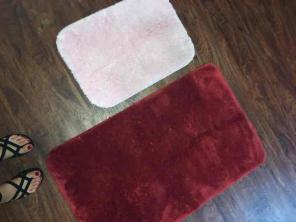 Red and light pink floor rugs