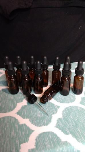 Dozen amber glass bottles w/ droppers
