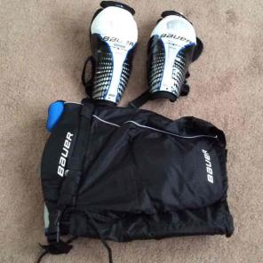 Youth hockey pants and shin guards