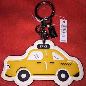 Coach Taxi bag charm