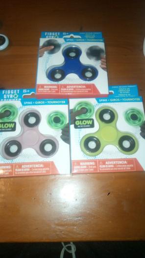 2 Glowing And One Regular Fidget Spinner