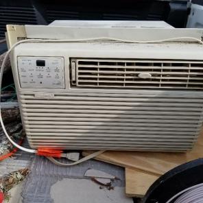 Kenmore 5600 btu window A/C with remote.
