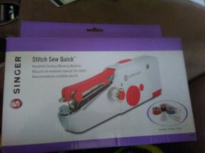 Handheld cordless sewing machine