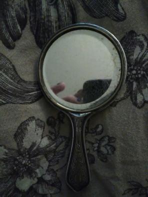 Antique hand mirror