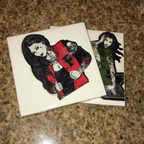 2 handmade coasters with tattoo models