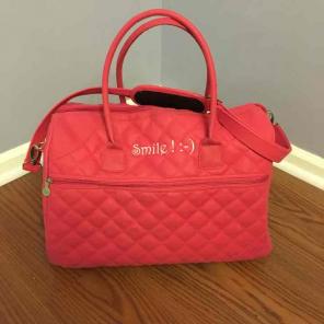Initials Inc weekend bag with embroidery
