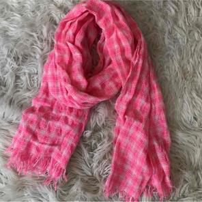 Bright pink plaid patterned scarf