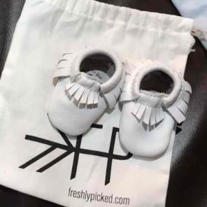 Freshly picked ivory white newborn Mocs