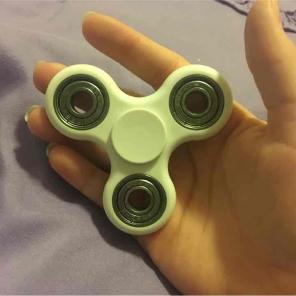 Grey and white fidget spinner