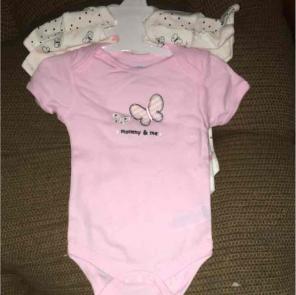 3/6 months 3 pieces onesie for a girl.