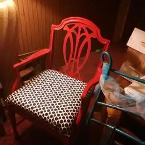 Red chair black and white seat