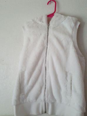 Furry white sleeveless vest