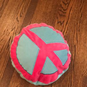 blue and pink peace pillow