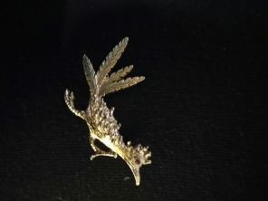 Antique roadrunner pin Ruby eye