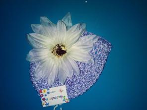 Newborn knitted hat with flower