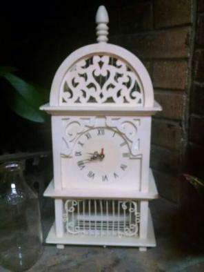 Vintage birdcage style clock