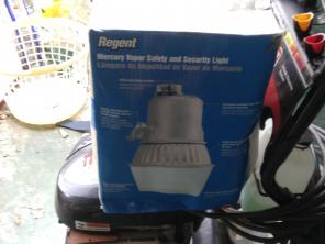 Mercury vapor security light. Brand new