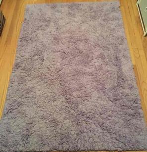 Purple fuzzy room rug