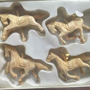 Hand carved carousel ornaments