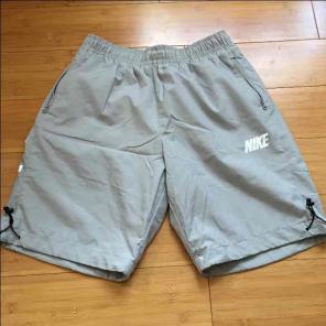 NIKE SWIM TRUNKS SIZE MEDIUM
