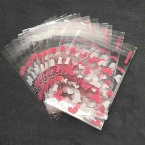 20 pink hearts self seal mini cello bags
