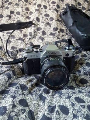 Canon AE-1 film camera.