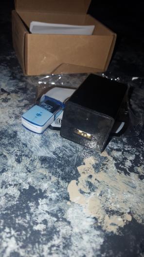 Hidden camera charging plug