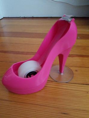 High heel shoe tape dispenser