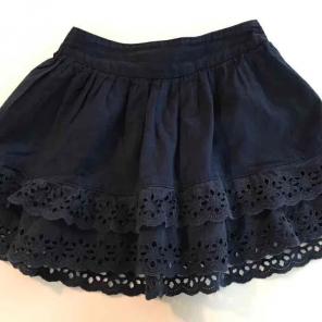 Girl's navy eyelet skirt