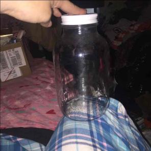 Glass jar with white lid