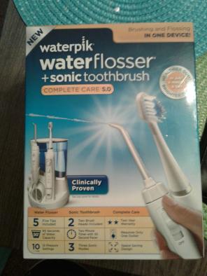 Electric toothbrush and waterflosser