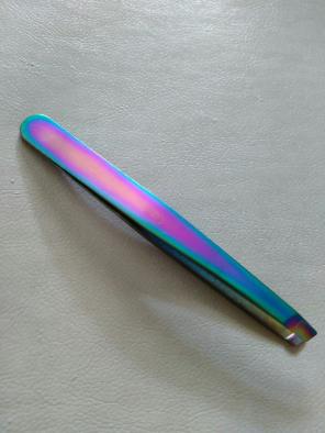 Scorched titanium tweezers