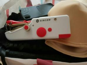 Singer hand sewer