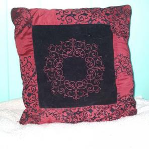 Red and black decorative pillow