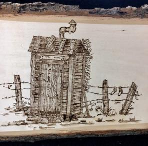 Outhouse By Fence
