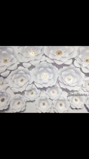 All white paper flower/wall decor gold
