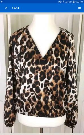 Bebe women's animal cheetah print blouse