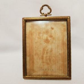 Tin frame with bubble glass
