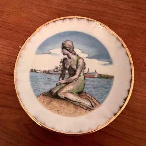 Nude girl on a rock