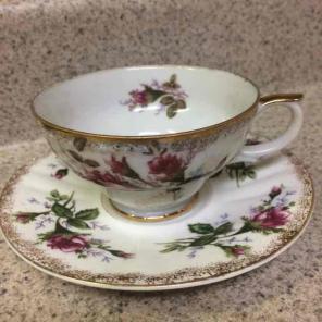 Tea cup and saucer -- Rose
